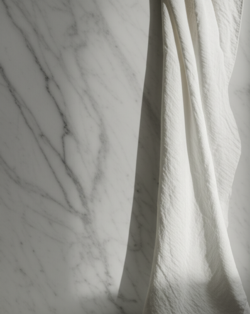 An elegant and pure composition of luxurious textures, representing the essence of quiet luxury.